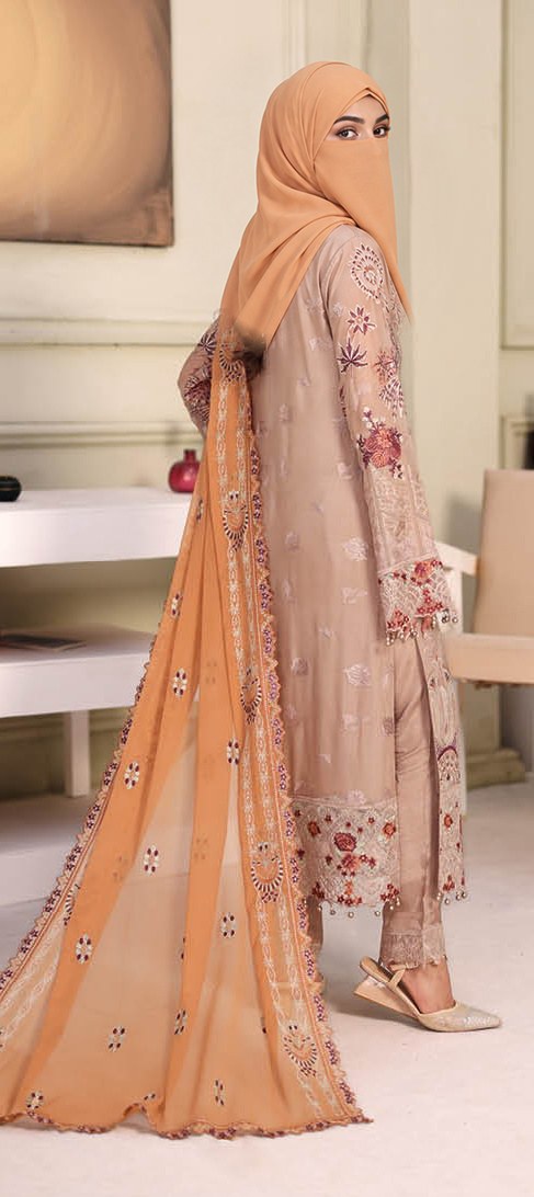 Ramsha Chiffon — Burnt Orange (back), styled with a matching niqab